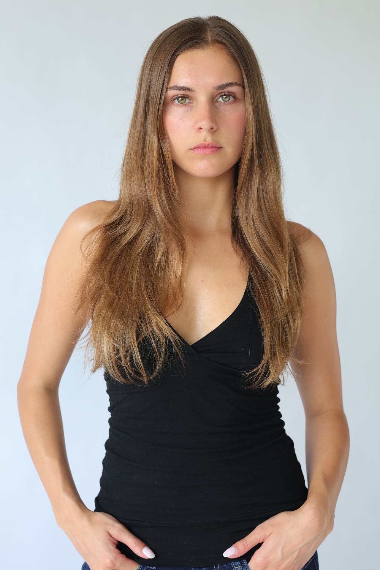 Headshot digital of Cameron MacDonald in a black top